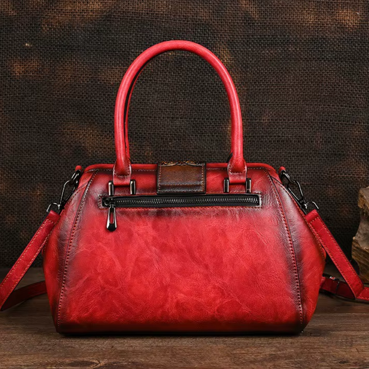 Florina - Handväska i läder med gravyr och blommönster