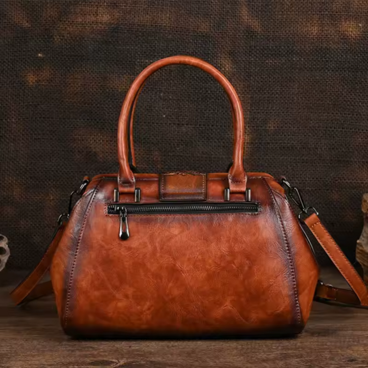 Florina - Handväska i läder med gravyr och blommönster